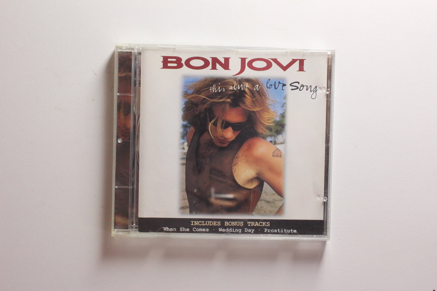 Bon Jovi - This Ain't A Love Song (G+)